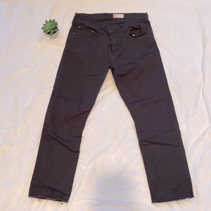 Distressed hem black wrangler jeans